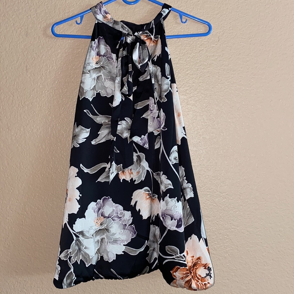 White House Black Market Sleeveless Floral Turtleneck top.